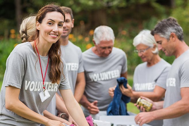 woman volunteering at a humanitarian aid drive.