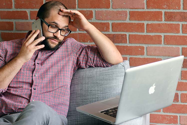 Frustrated office manager fed up with bad commercial cleaning and ready to fire his cleaning company.