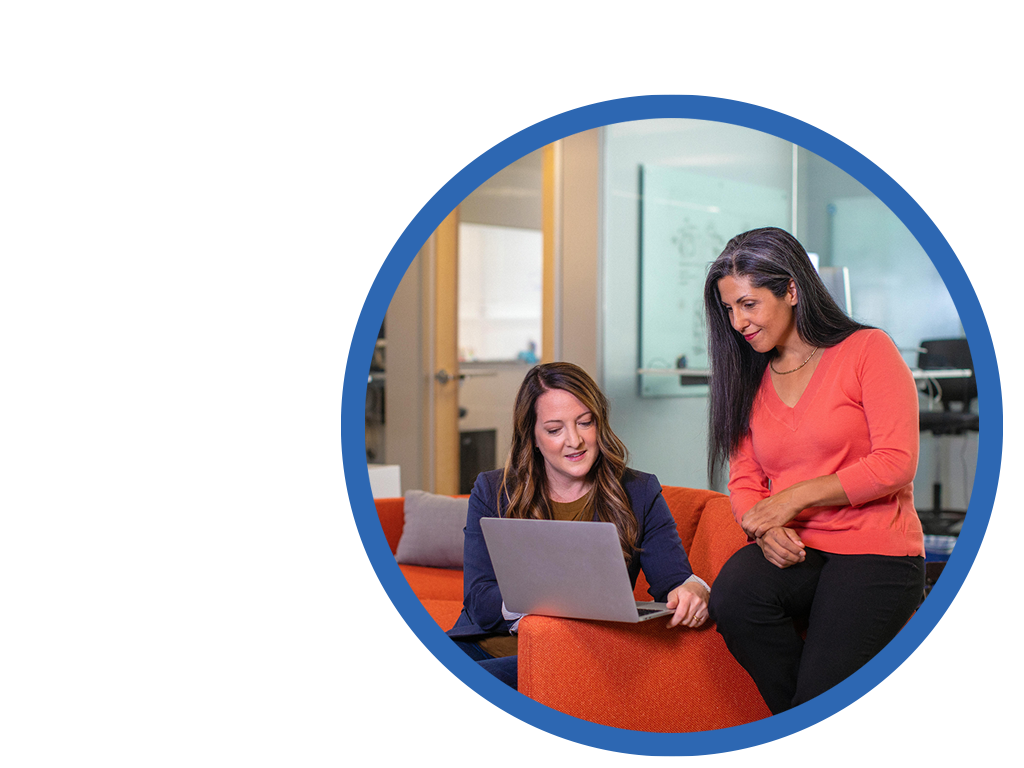 Happy office professionals woking in sanitized and professionally cleaned workplace