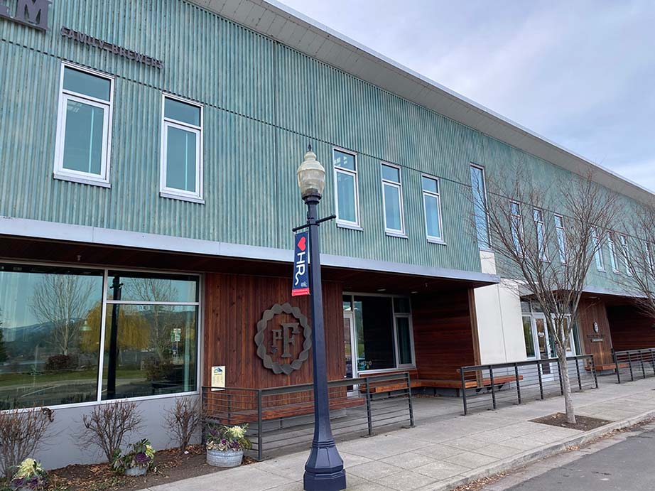 overview-about-clean-building-exterior-scaled Clean commercial office building exterior.