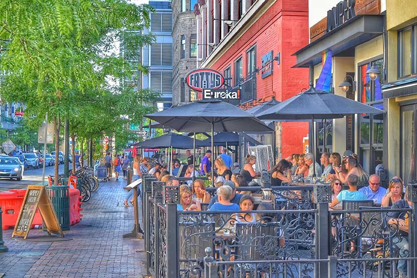 A busy and bustling Boise Idaho street with dining tourists