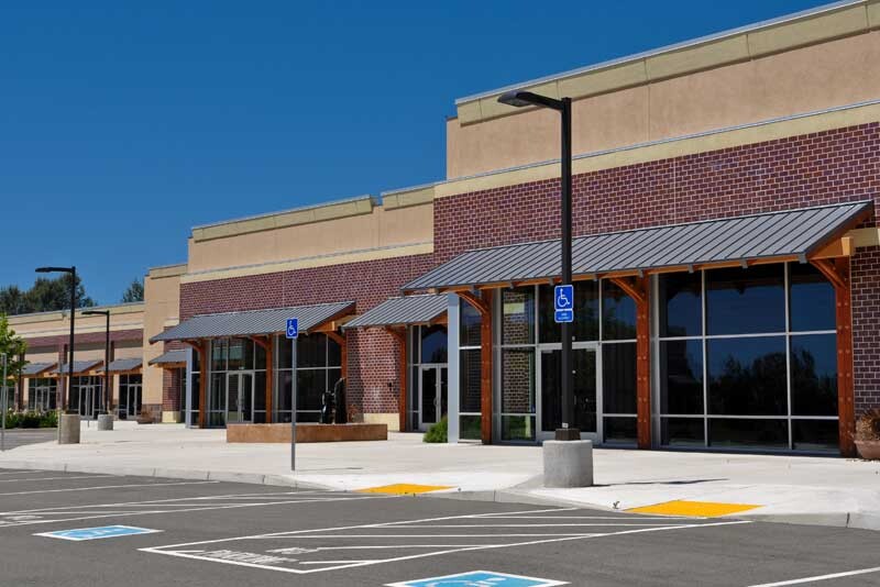 clean storefront with clean commercial awnings