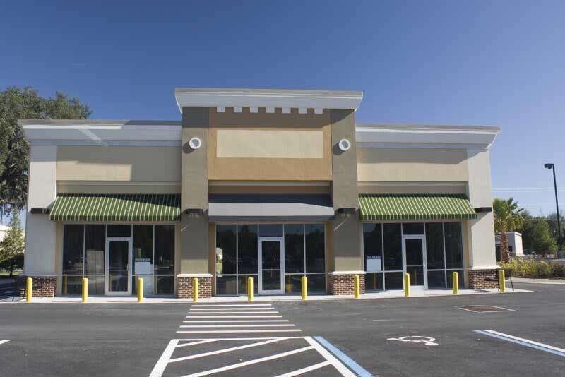 Clean commercial building with clean exterior awnings