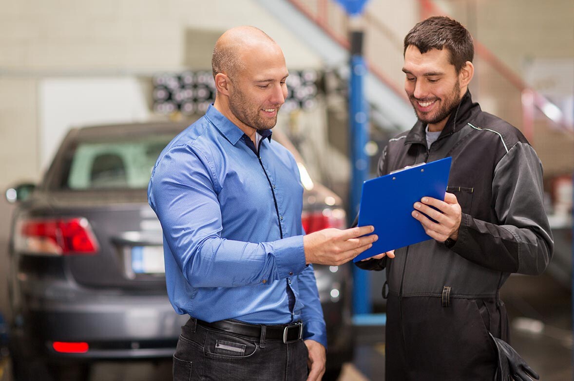 Auto shop and tire shop manager in a clean facility.