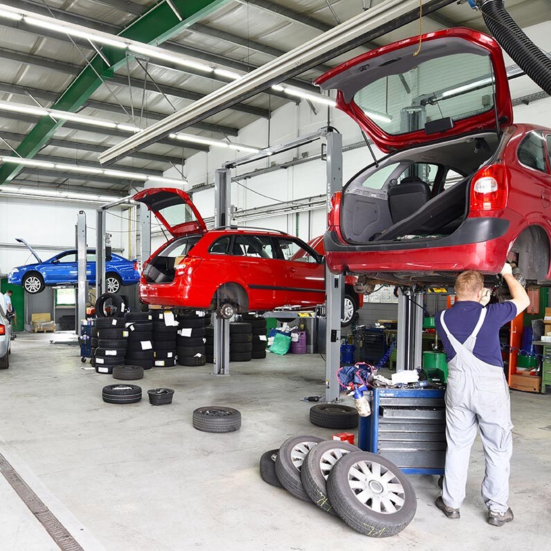 Tire shop pros in a clean shop